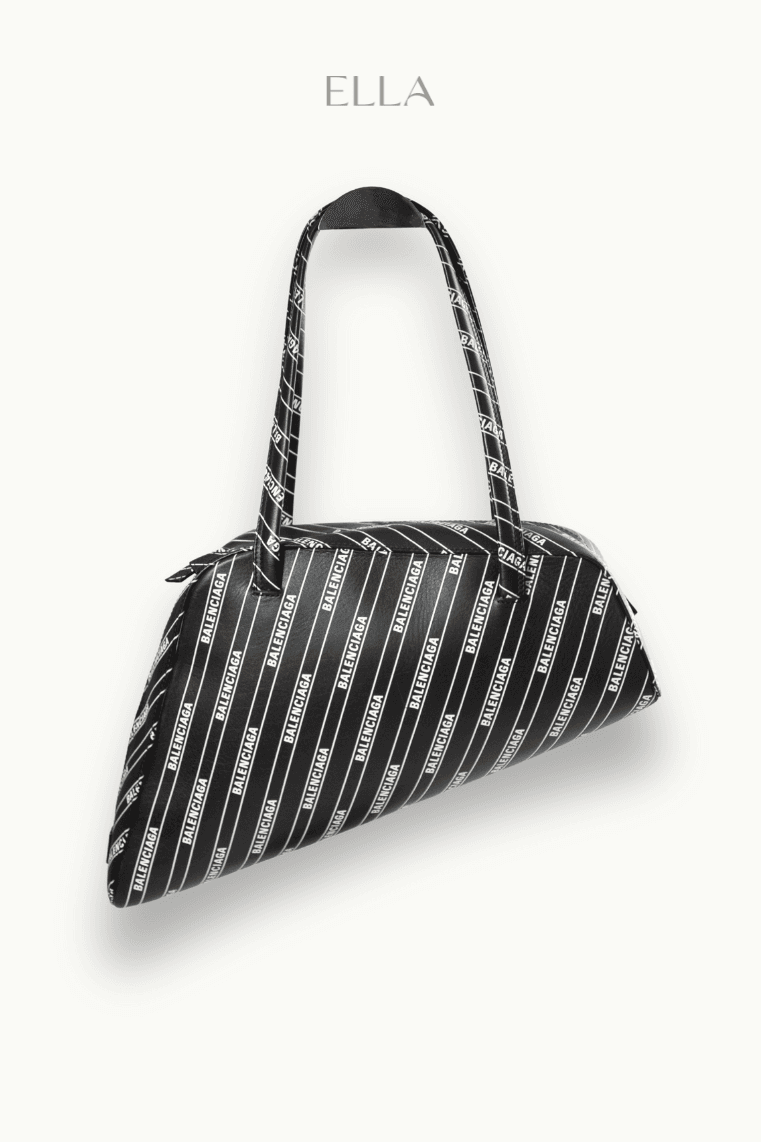 Tall slender porcelain bottle with natural clay textured body and cork stopper.